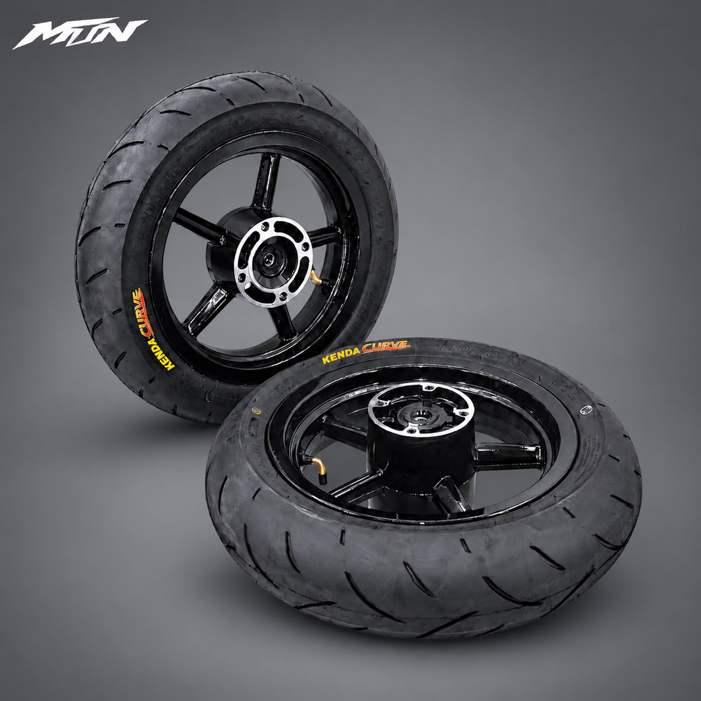 12-inch black supermoto wheel and tire set with 90/90-12 front and 120/70-12 rear street tires