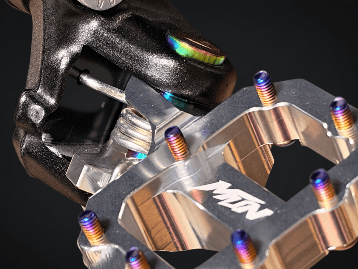 2026 Ultra Bee Titanium Footpeg Pivot Pins | Oil Slick | MTN MOTOWORKS E-Moto Performance Parts & Accessories#