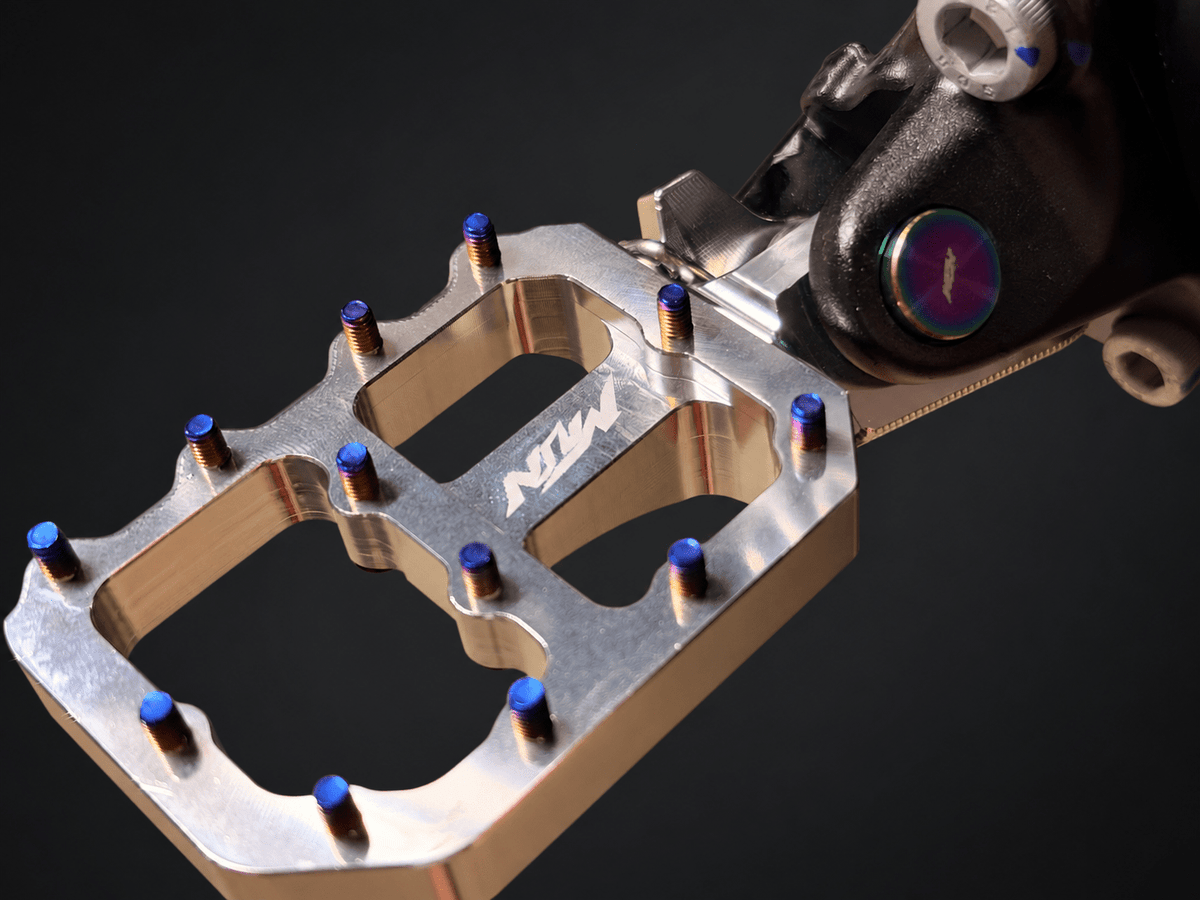2026 Ultra Bee Titanium Footpeg Pivot Pins | Oil Slick | MTN MOTOWORKS E-Moto Performance Parts & Accessories#