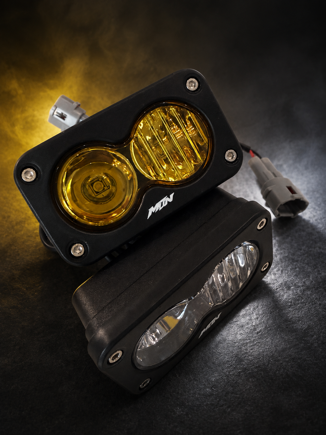 MTN Sur-Ron LBX plug-and-play Baja LED headlight options in white and yellow, stacked view