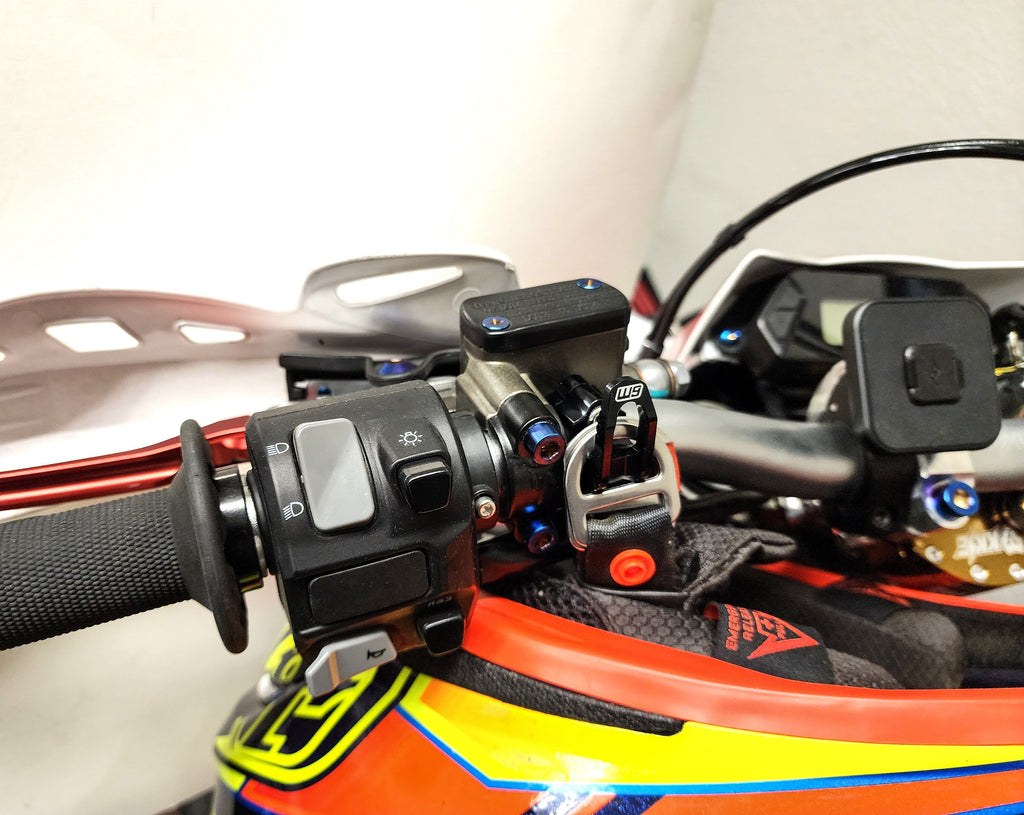 MTN Helmet Hook mounted on Sur-Ron handlebar