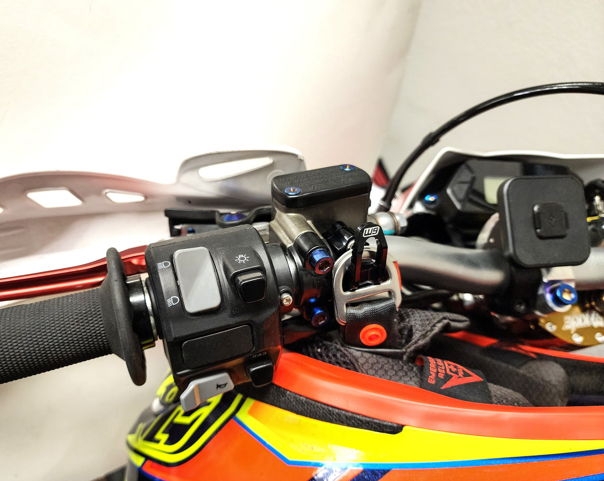 MTN Helmet Hook mounted on Sur-Ron handlebar