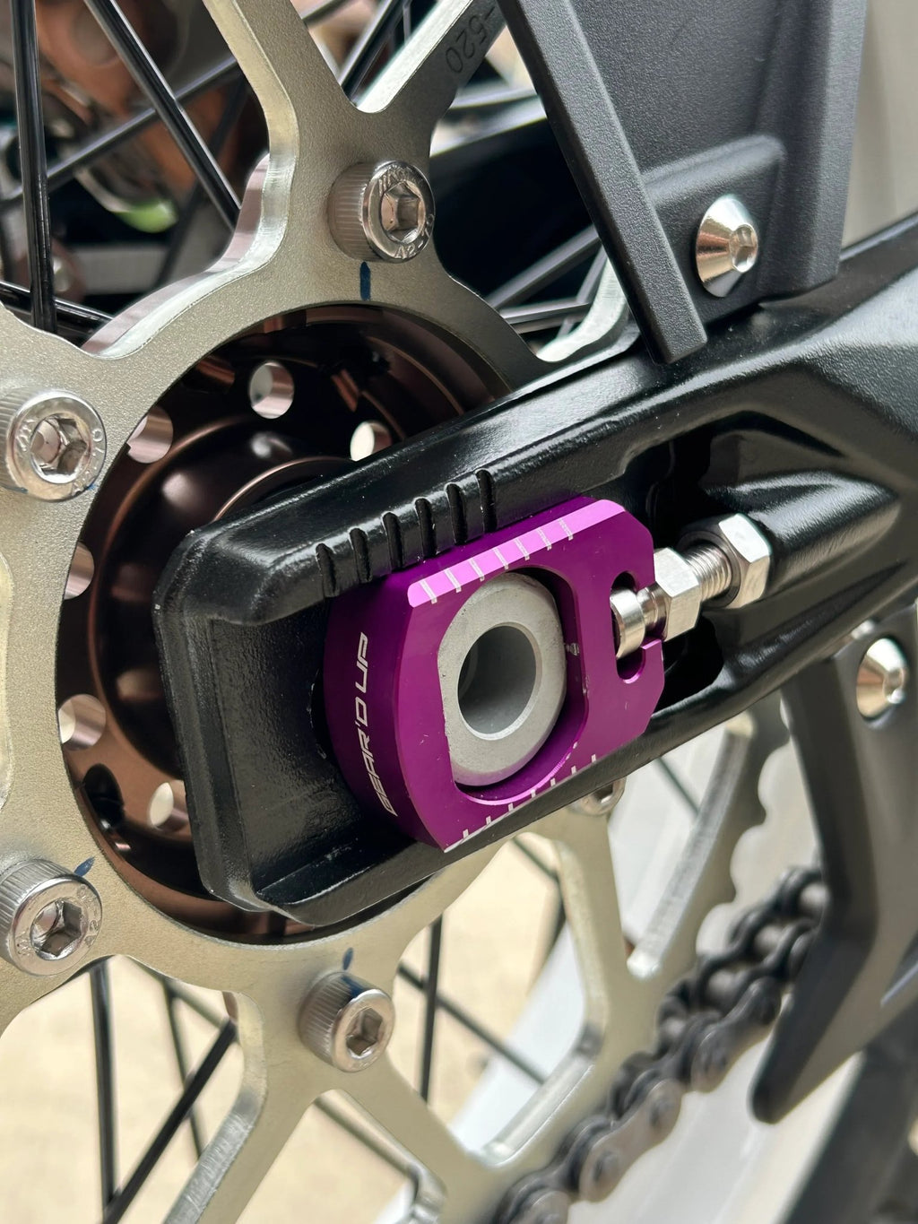 Gear’d Up Surron Ultra Bee Axle Blocks — Chain Adjusters | MTN MOTOWORKS E-Moto Performance Parts & Accessories