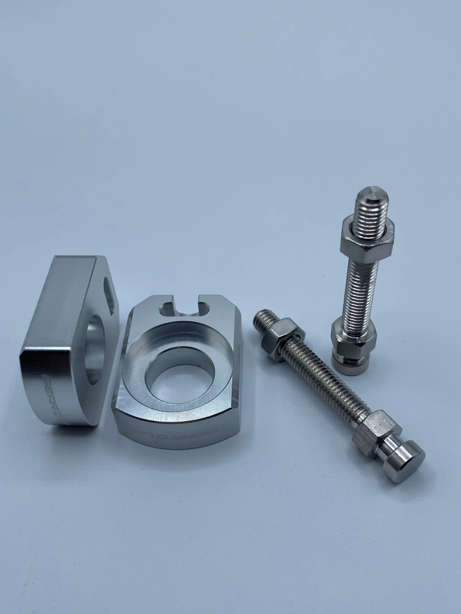 Gear’d Up Surron Ultra Bee Axle Blocks — Chain Adjusters | MTN MOTOWORKS E-Moto Performance Parts & Accessories
