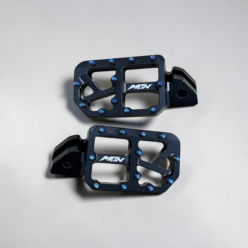 MTN Footpegs V1 Series with titanium grip pins for e-moto and electric dirt bike platforms