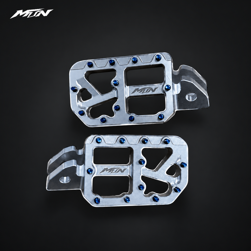 MARK I 7075 wide footpegs, raw silver finish and oil slick titanium pins, overhead view
