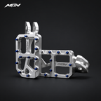 MARK I 7075 wide footpegs with 57mm platforms, raw silver finish and oil slick titanium pins, studio view
