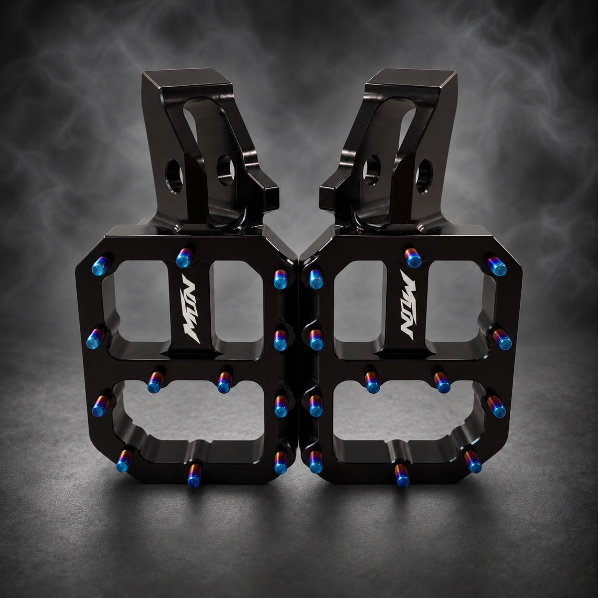 MTN MARK II Black Sur-Ron Ultra Bee footpegs showing dedicated mounting configuration