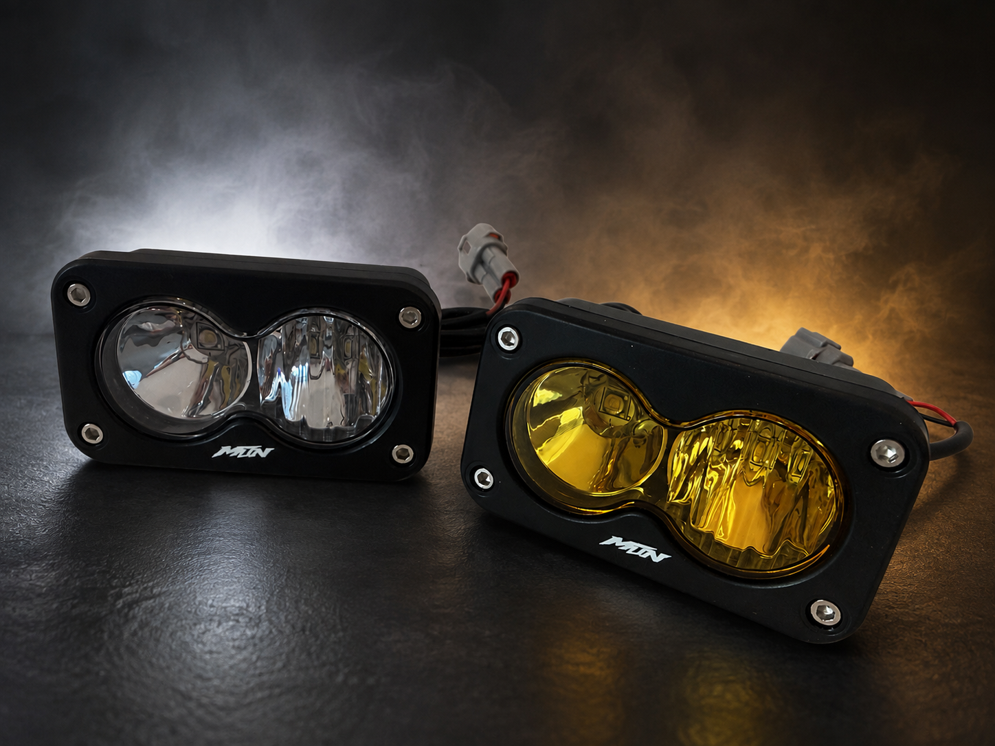 MTN Sur-Ron LBX plug-and-play Baja LED headlight options in white and yellow, side-by-side view