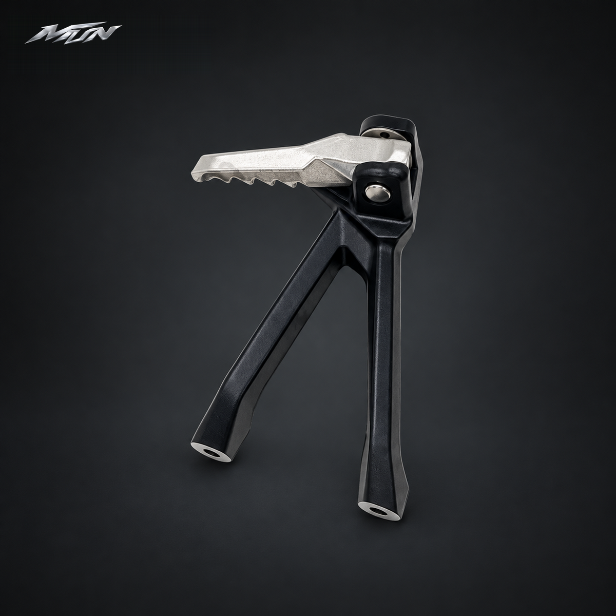 Single Sur-Ron Ultra Bee folding passenger footpeg in the closed, locked position with serrated silver platform and black bracket — MTN MotoWorks